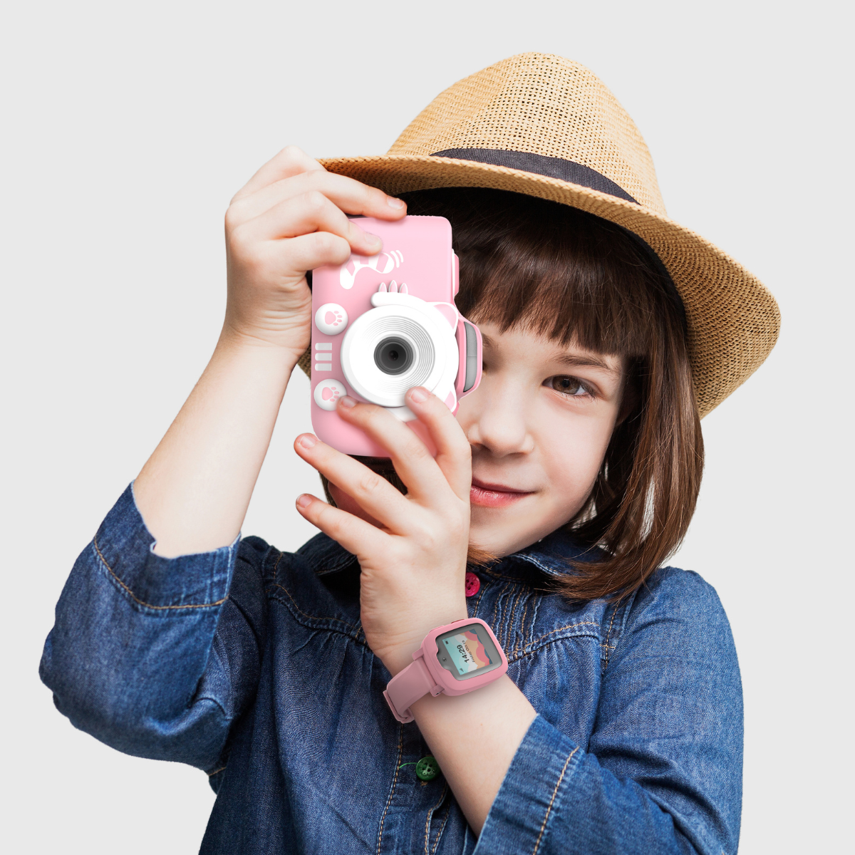 Girl holding kids digital camera - myFirst Camera 3 Pink